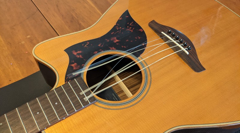 How to Restring an Acoustic Guitar - take off the old strings